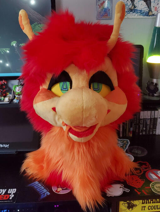 Squibz The head of Squibz, a brightly colored cartoon-styled caterpillar.